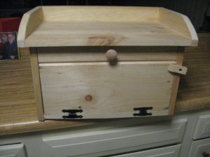 Bread Box will hold loaf of bread plus English muffins plus pastries, etc. 12 1/2"Hx19"Wx13"D $46.00