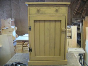 Keeping Cabinet with two shelves plus the drawer is  31"Hx19"wx11"D $147.00